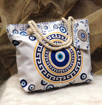 Decorative bag with blue and yellow patterns on a textured surface